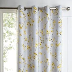 Dunelm Alisha Yellow Blackout Eyelet Curtains